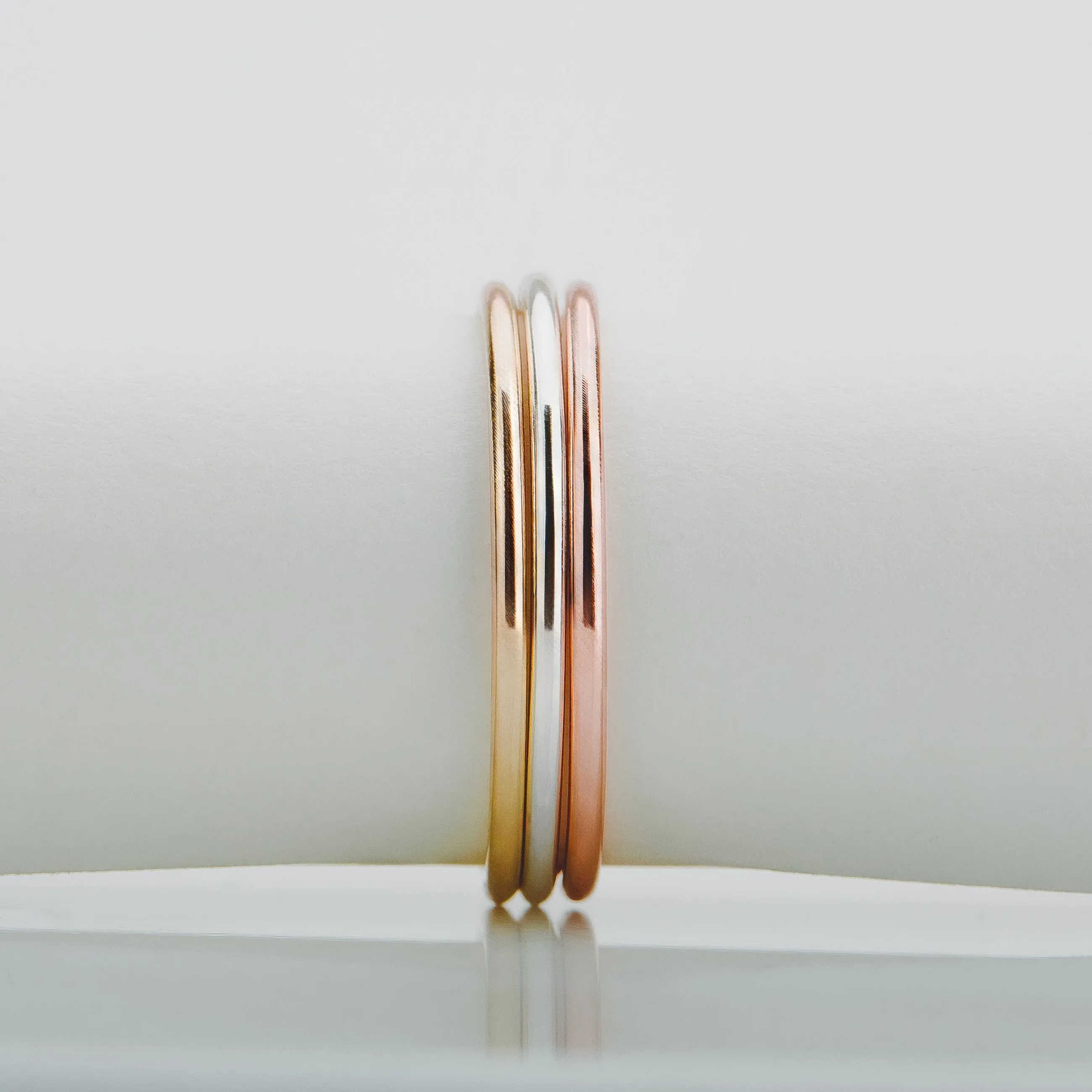 Trio of Smooth Stacking Rings