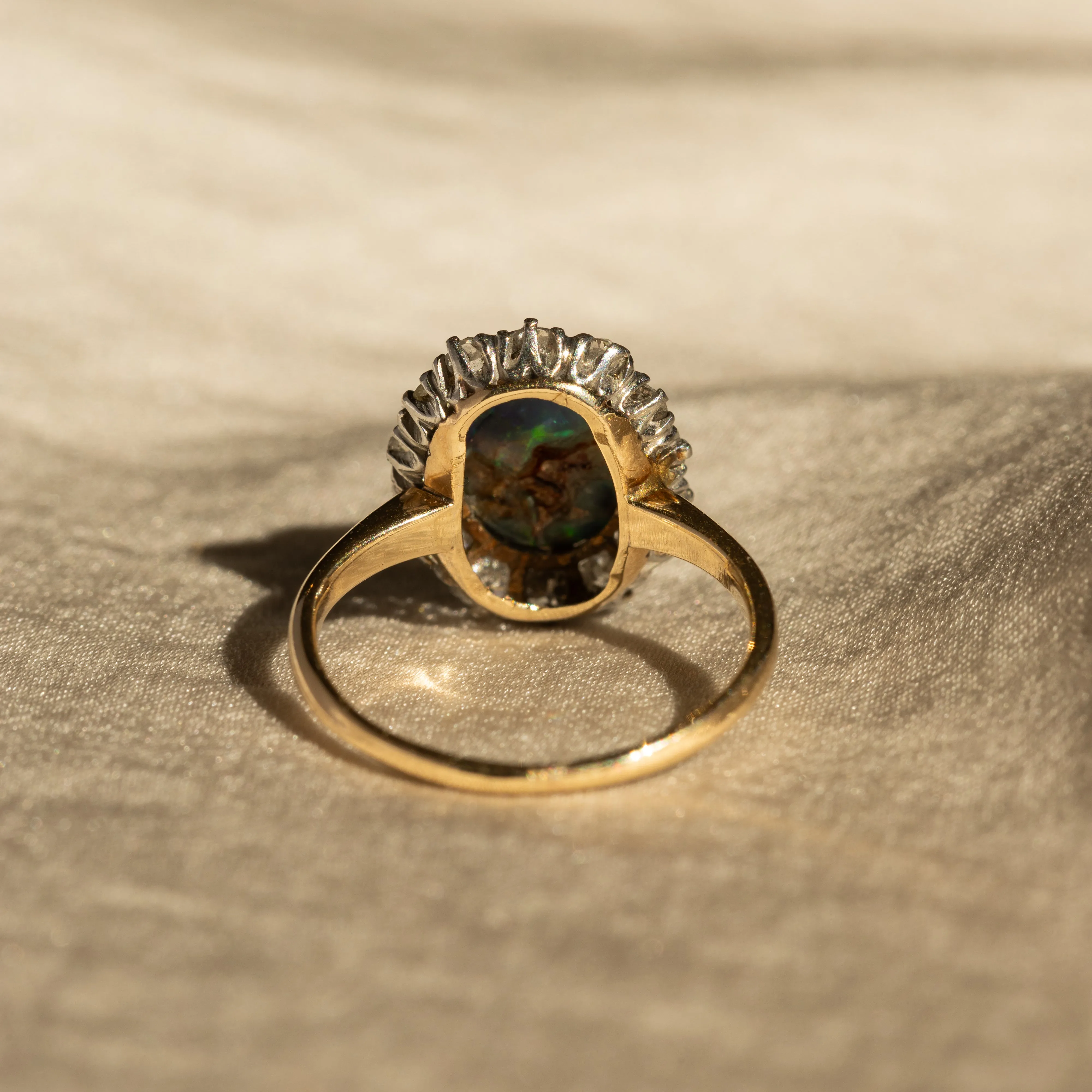 Victorian 0.80 Carat Natural Black Opal Diamond Halo Ring