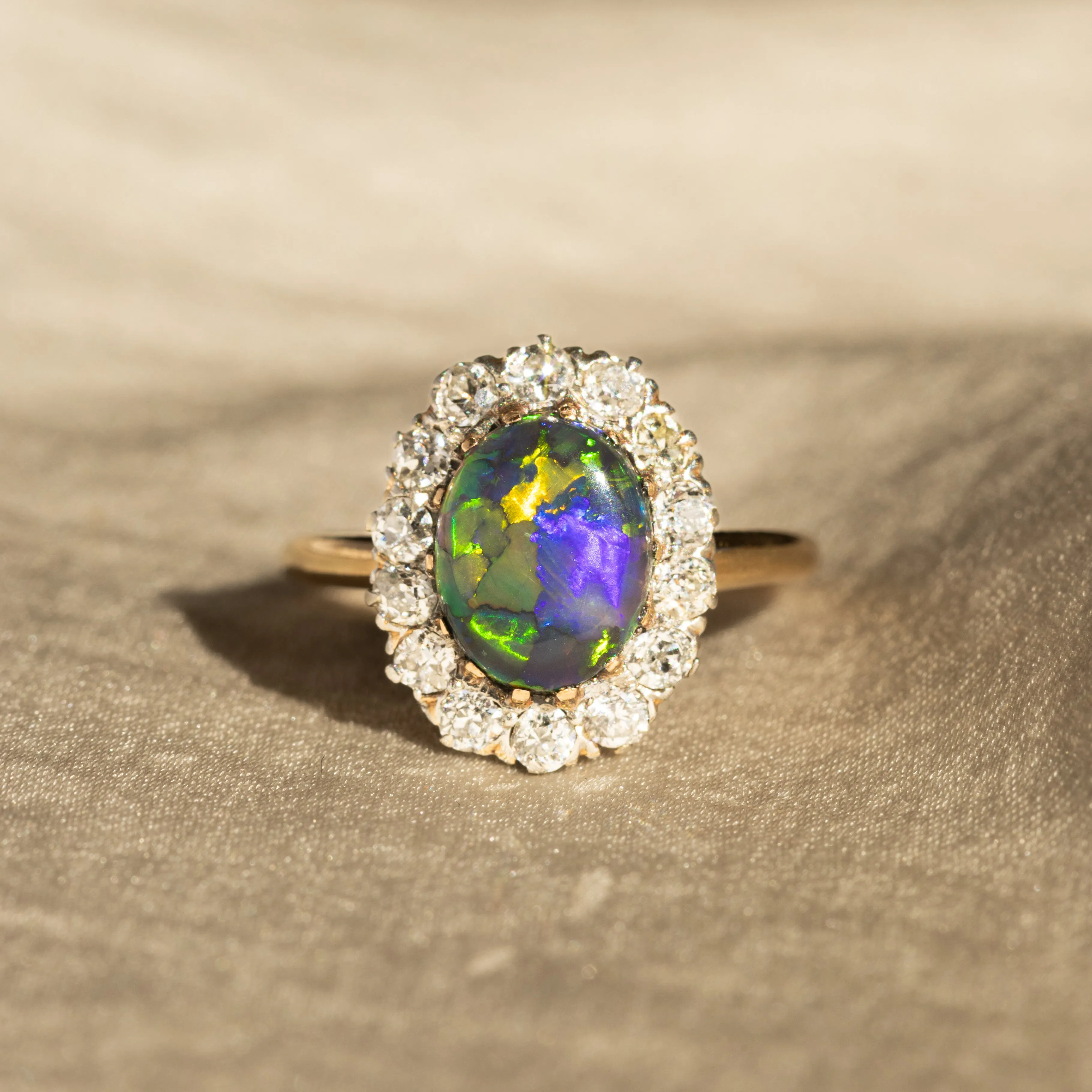 Victorian 0.80 Carat Natural Black Opal Diamond Halo Ring